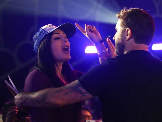 <p>Republican activist Laura Loomer shouts at Jack Dorsey creator, co-founder, and Chairman of Twitter and co-founder & CEO of Square, as he speaks on stage during the crypto-currency conference Bitcoin 2021</p>