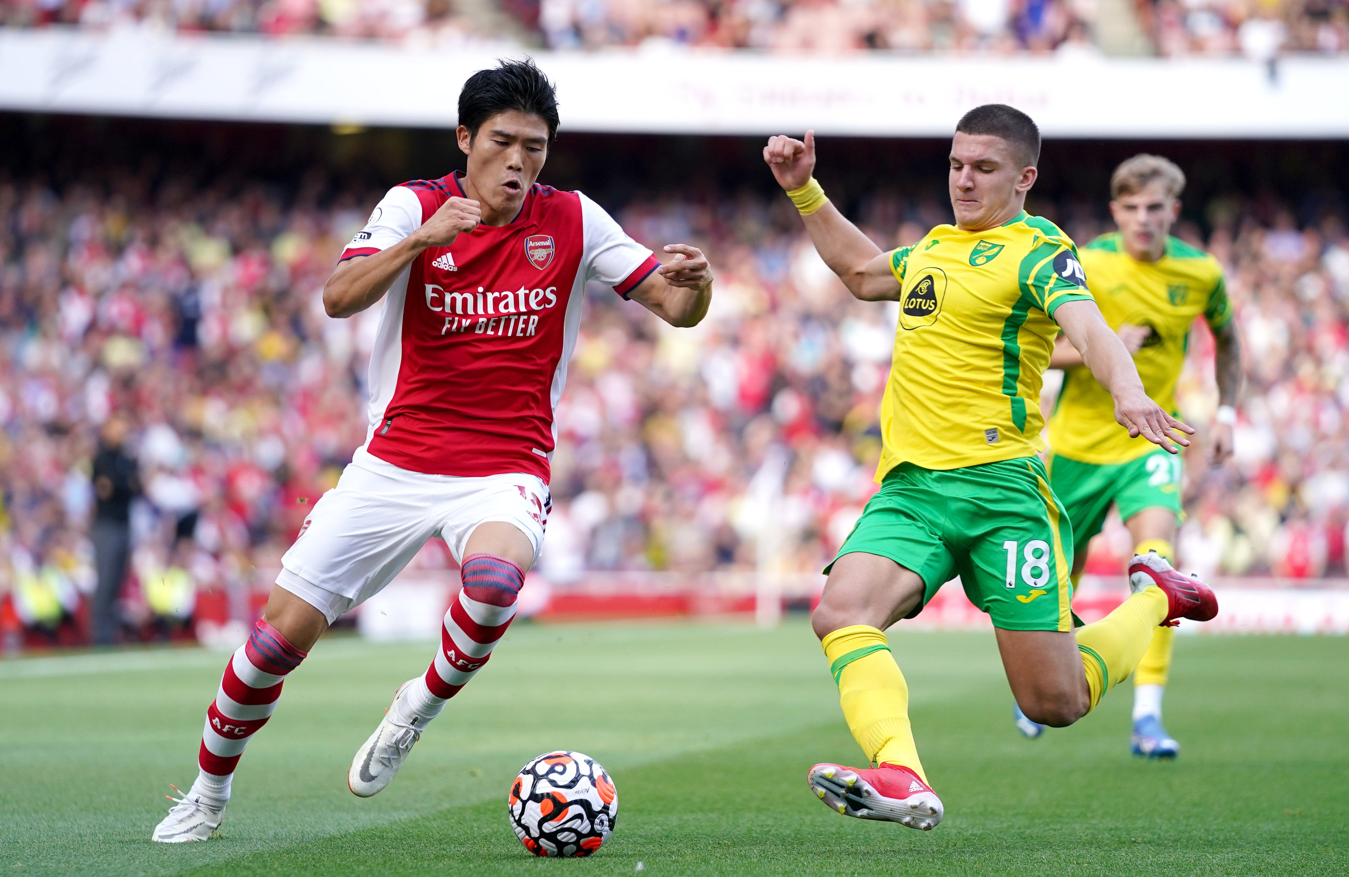 Takehiro Tomiyasu, left, was one of six new Arsenal signings (Tess Derry/PA)