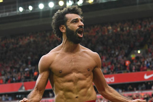 <p>Mohamed Salah celebrates scoring for Liverpool </p>