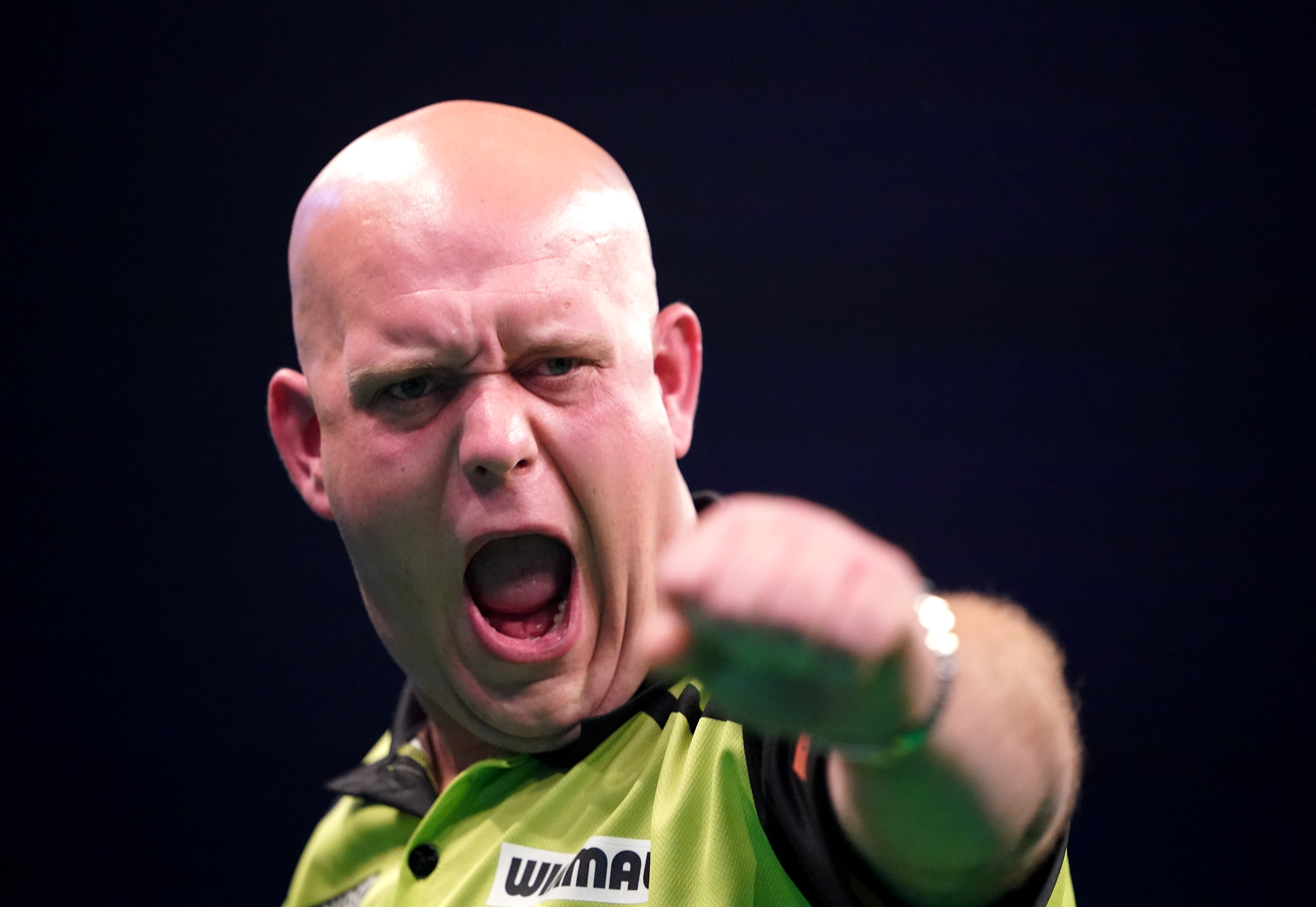 Michael Van Gerwen, pictured, had to work had to see off Fallon Sherrock (Zac Goodwin/PA)