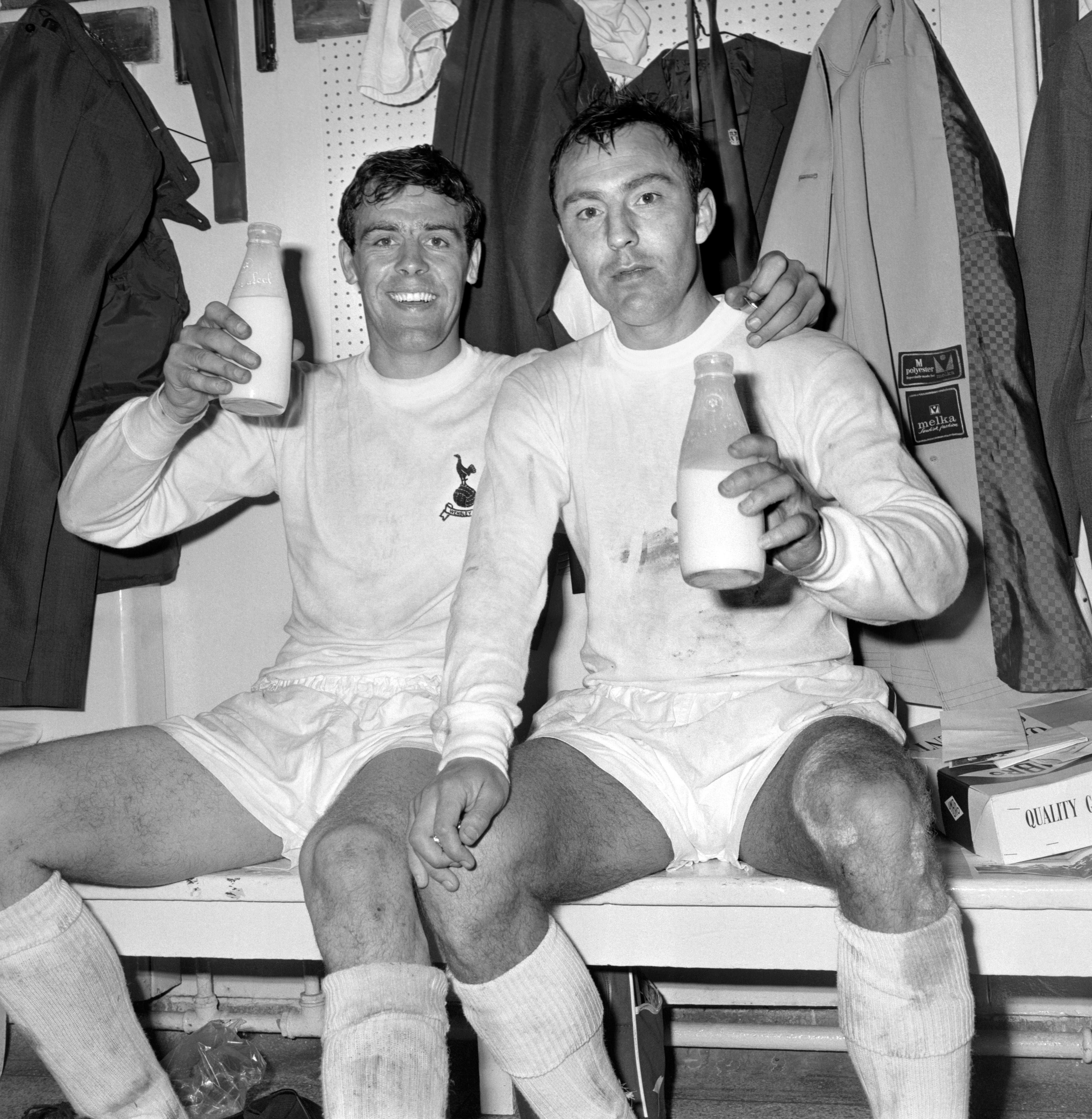 Jimmy Greaves and team-mate Mike England celebrate Spurs’ FA Cup final win over Chelsea (PA)
