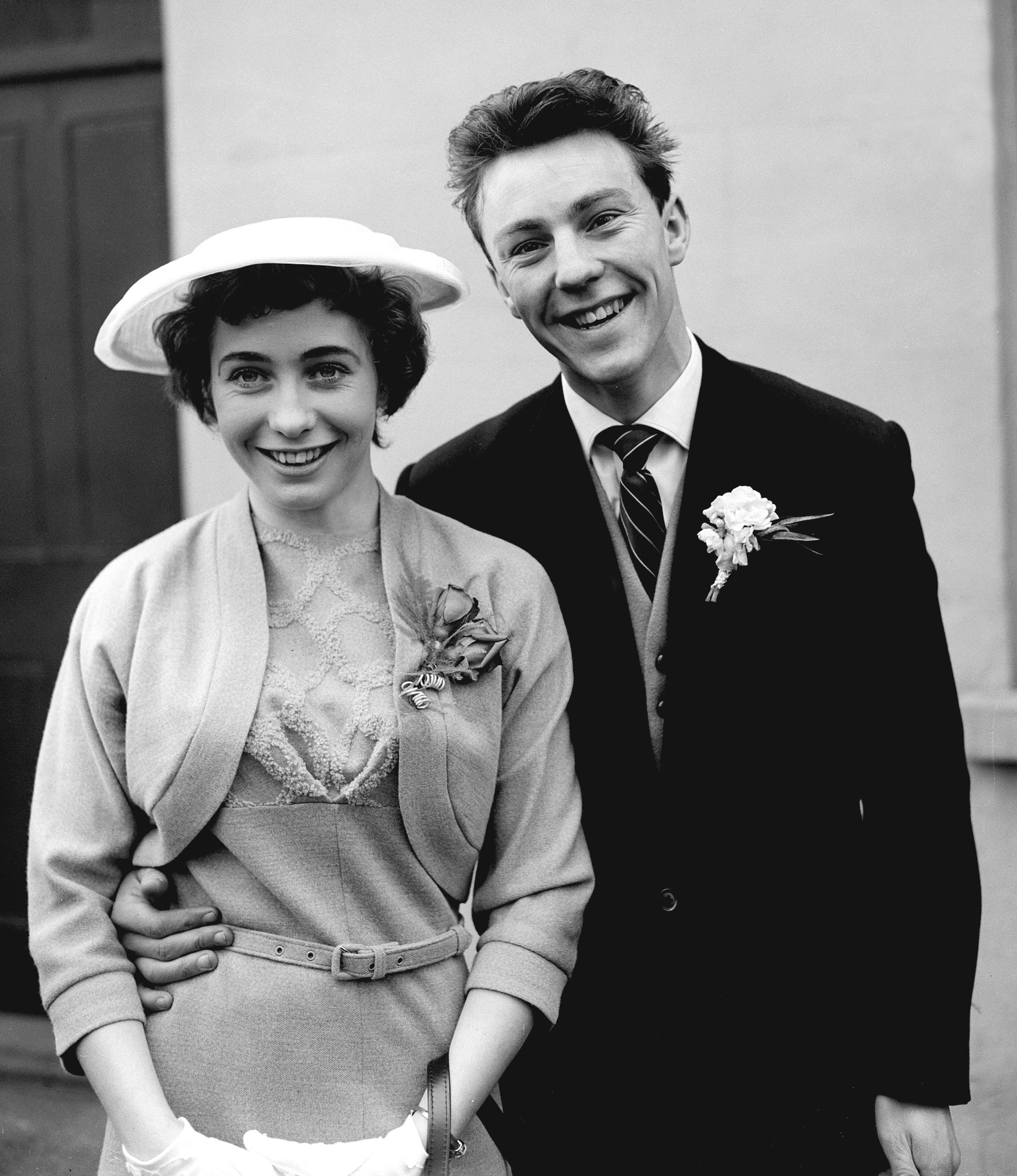 Jimmy Greaves, aged 18, with his bride Irene Barden after their wedding (PA)