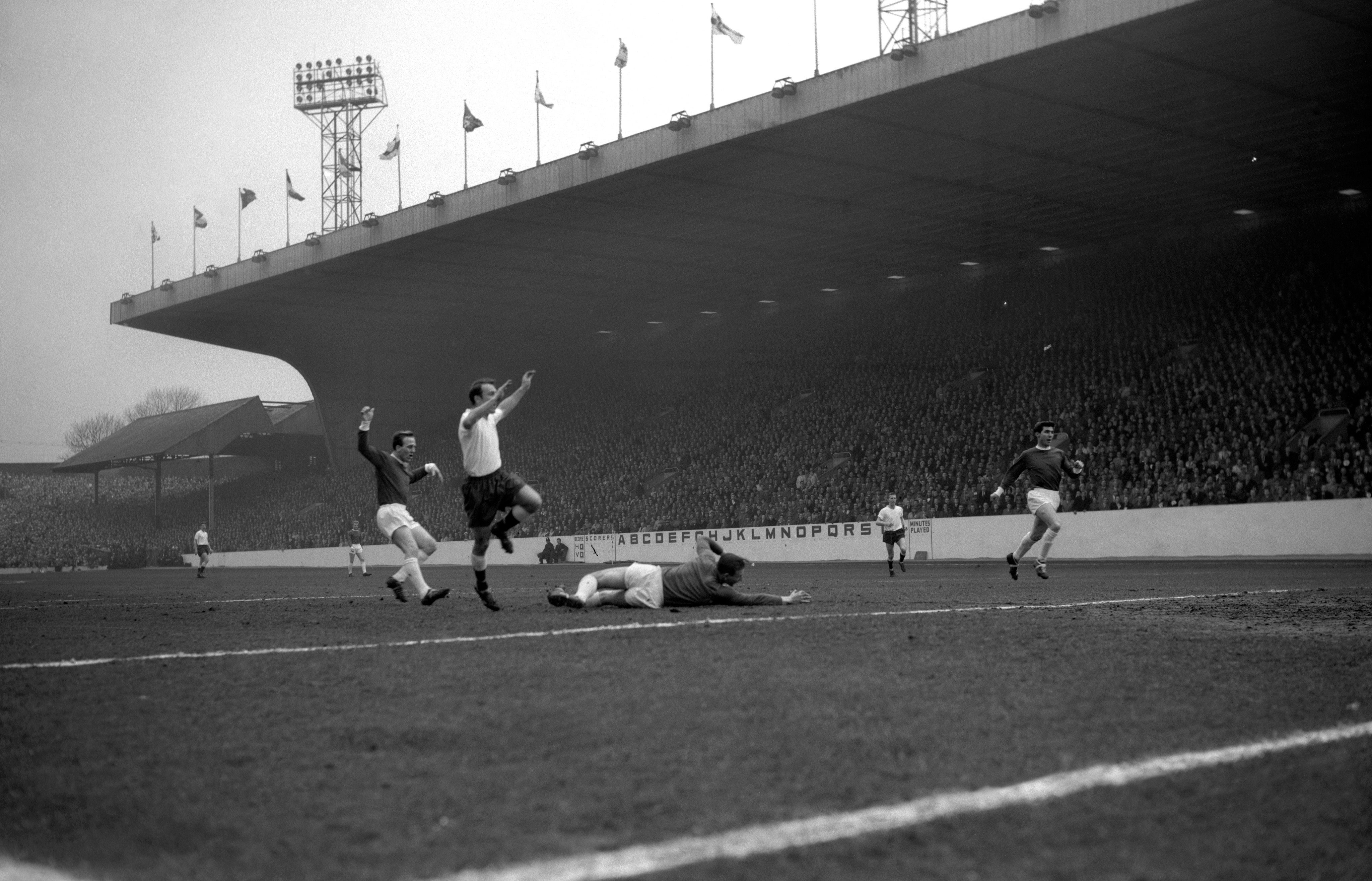 Jimmy Greaves scores in the 1962 FA Cup semi-final as Tottenham go on to win the cup (PA)