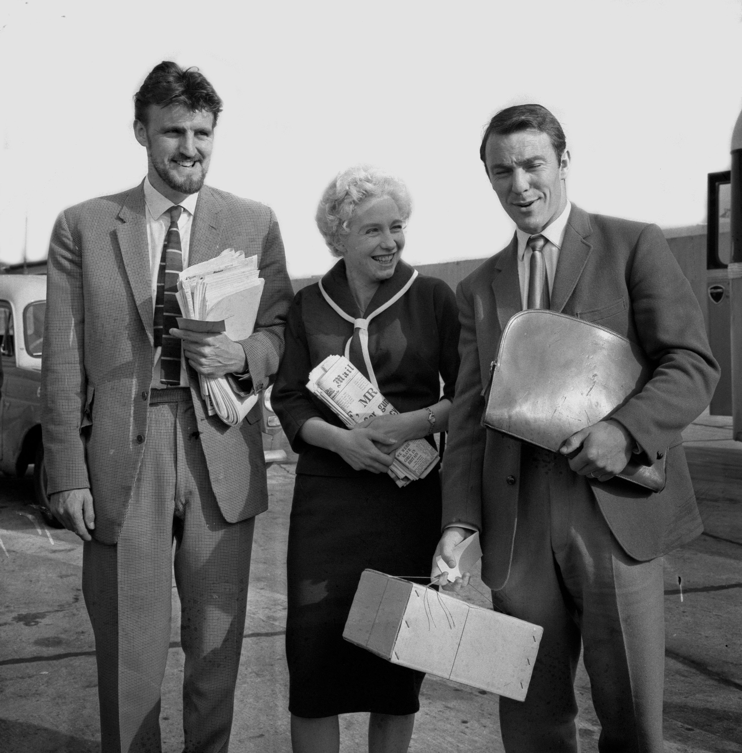 Jimmy Greaves at London Airport with his wife Irene and PFA chairman Jimmy Hill ahead of his move to AC Milan in the summer of 1961 (PA)