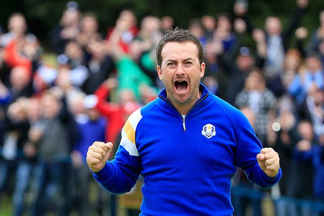 <p>McDowell celebrates defeating Jordan Spieth during the 2014 Ryder Cup at Gleneagles </p>