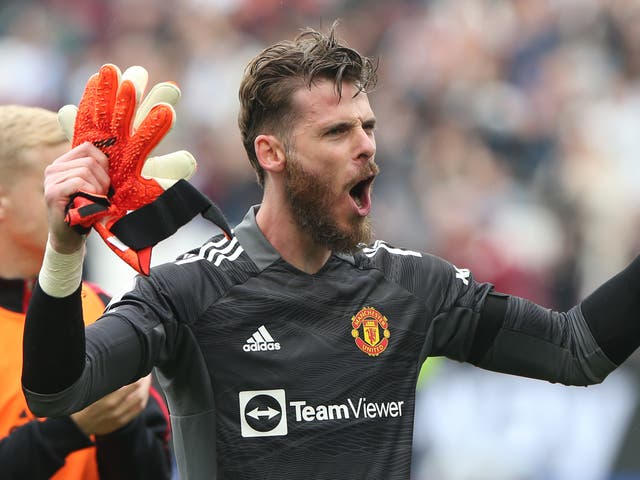 <p>Saving grace: De Gea celebrates after his save ensured all three points for his side </p>