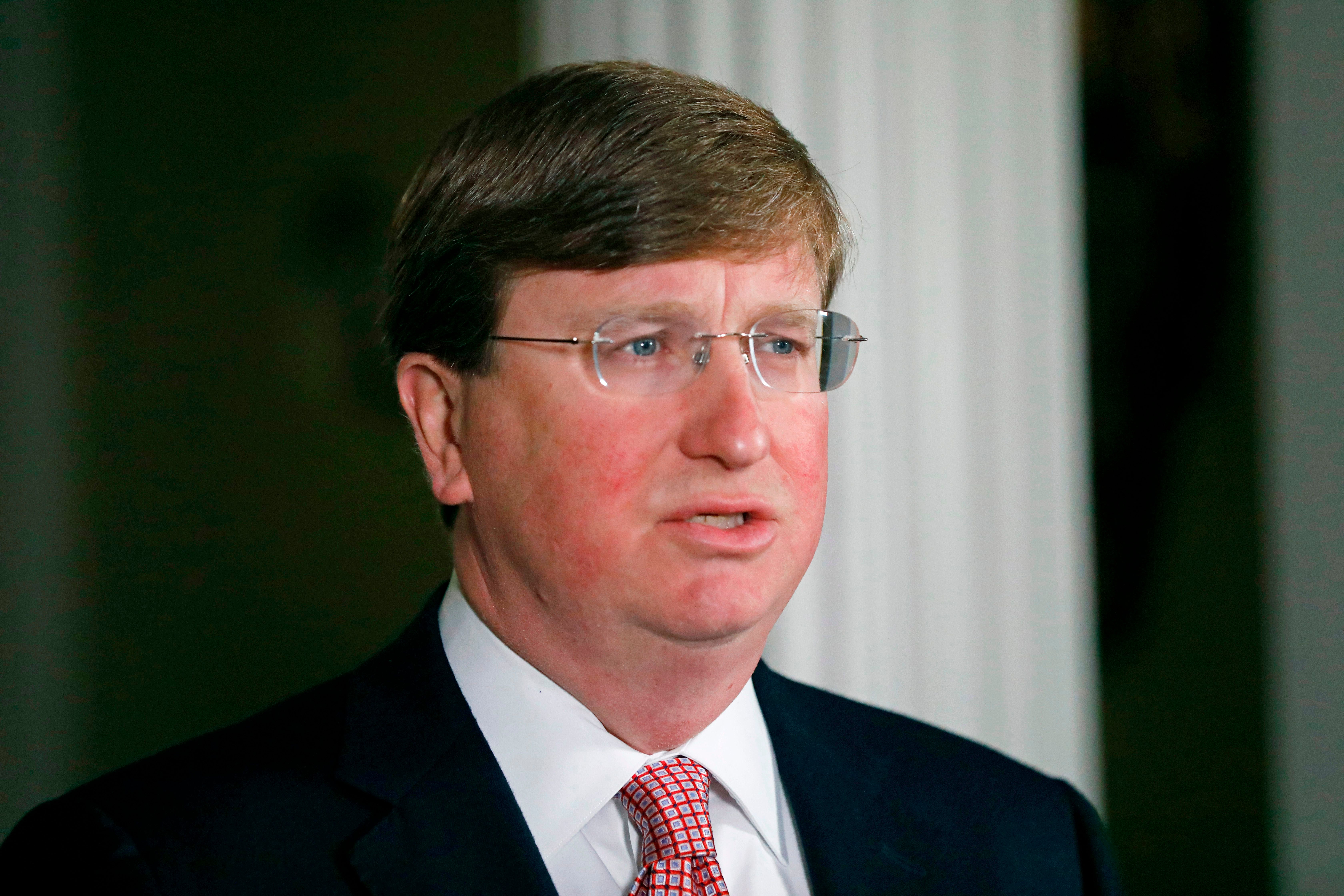 Mississippi Governor Tate Reeves speaks at a news conference