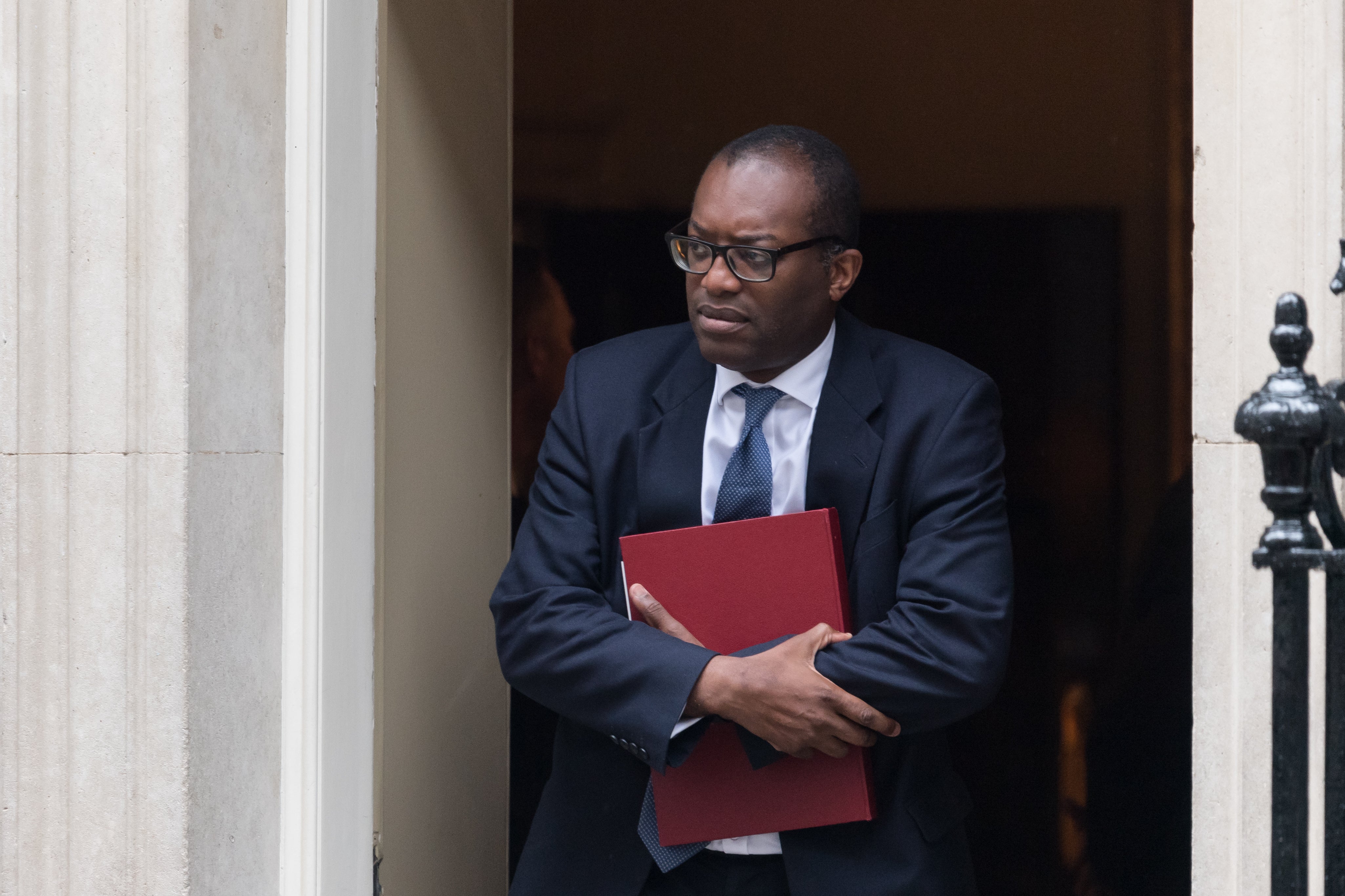 Secretary of State for Business, Energy and Industrial Strategy Kwasi Kwarteng leaves Downing Street after attending the weekly Cabinet meeting