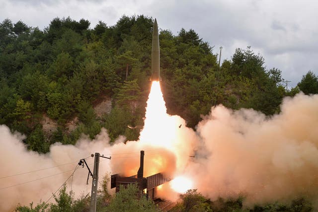 <p>File: This 15 September 2021 photo provided by the North Korean government shows a test missile being launched from a train in an undisclosed location of North Korea</p>