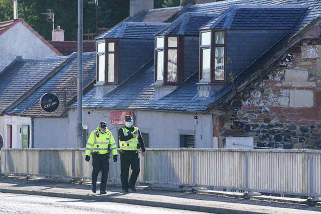 <p>Police in New Cumnock, East Ayrshire, after seven-year-old Carson Shephard was reported missing</p>