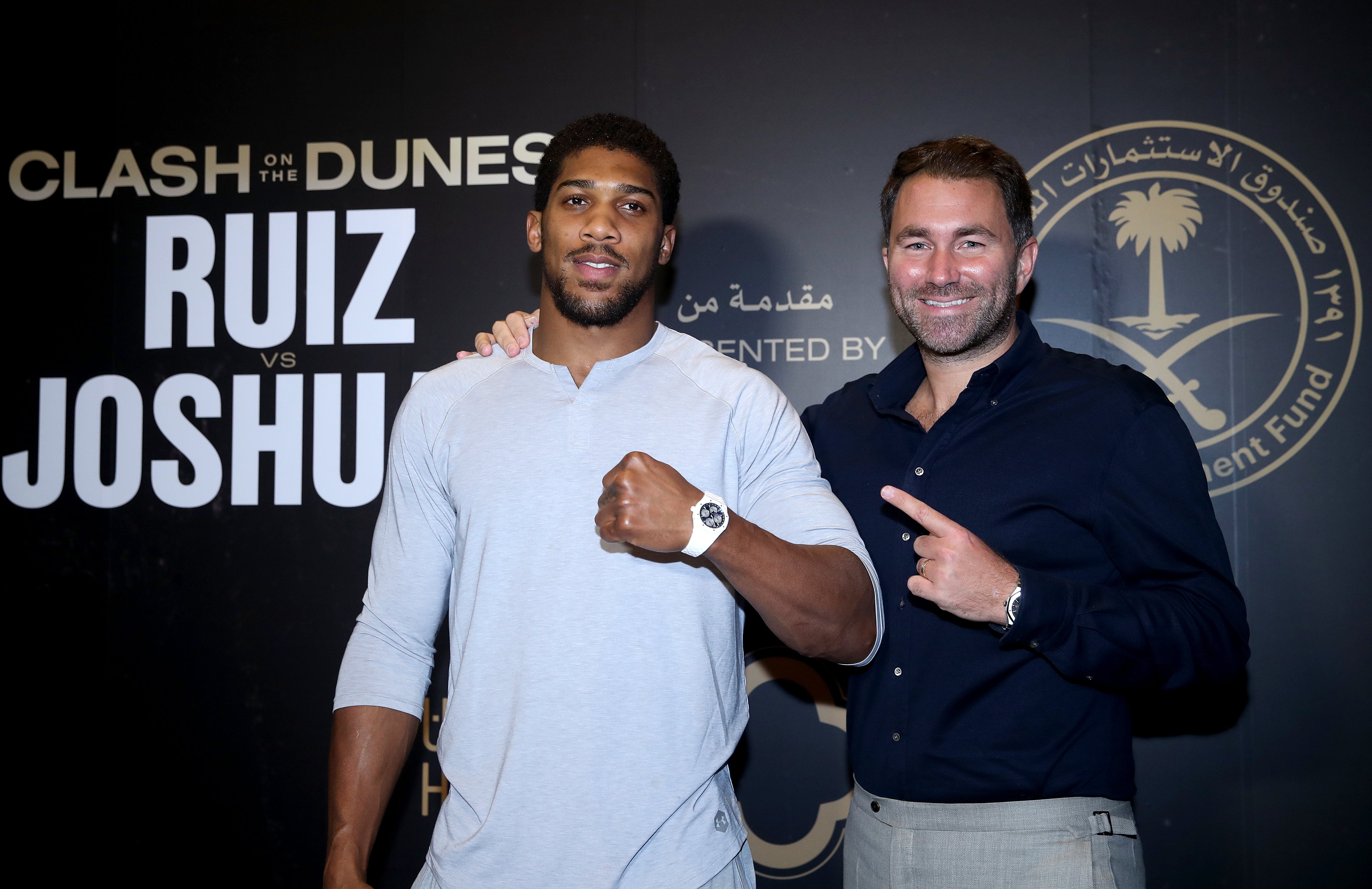 Anthony Joshua, left, is promoted by Eddie Hearn (Nick Potts/PA)