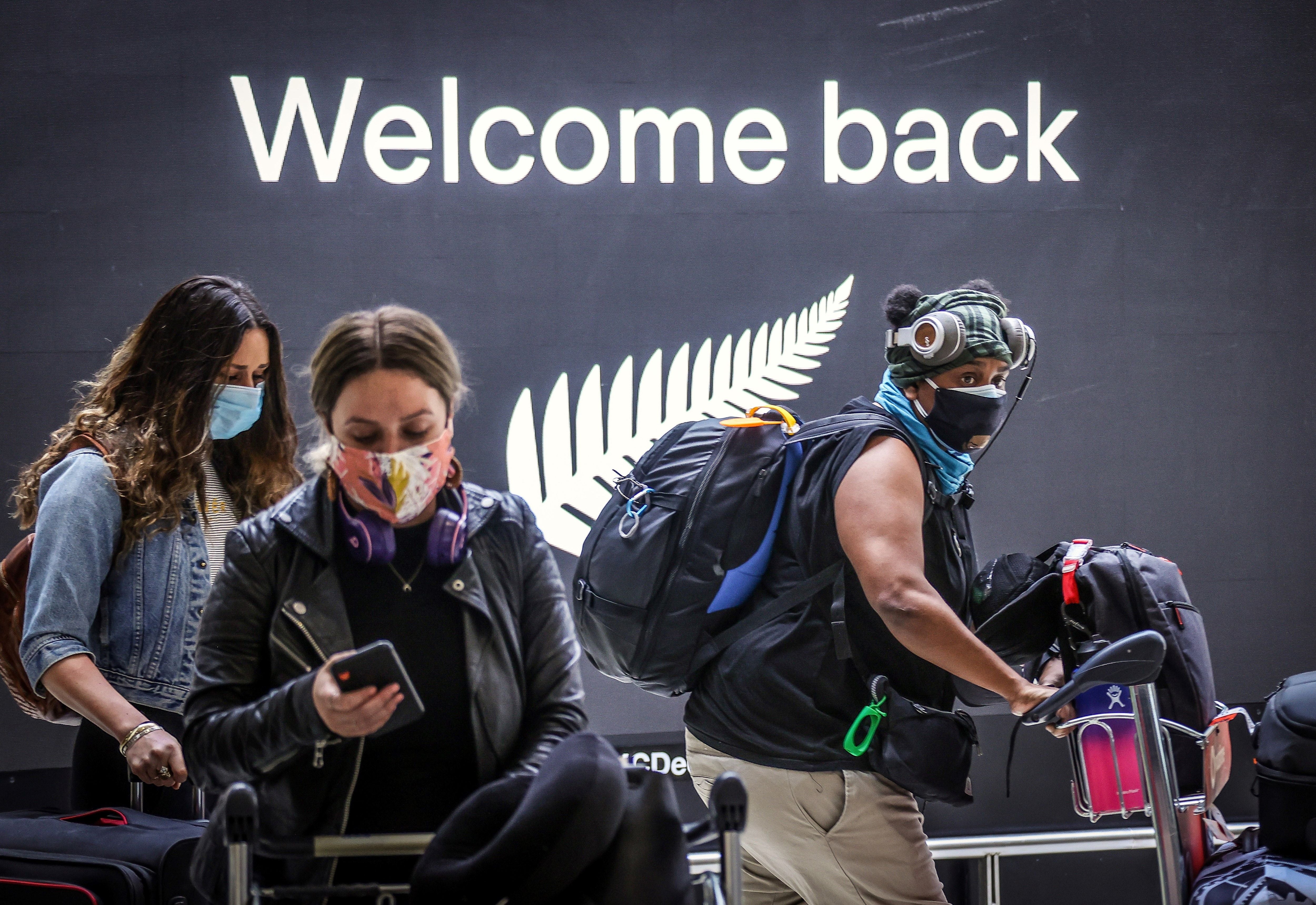 Passengers arrive from New Zealand at Sydney International Airport