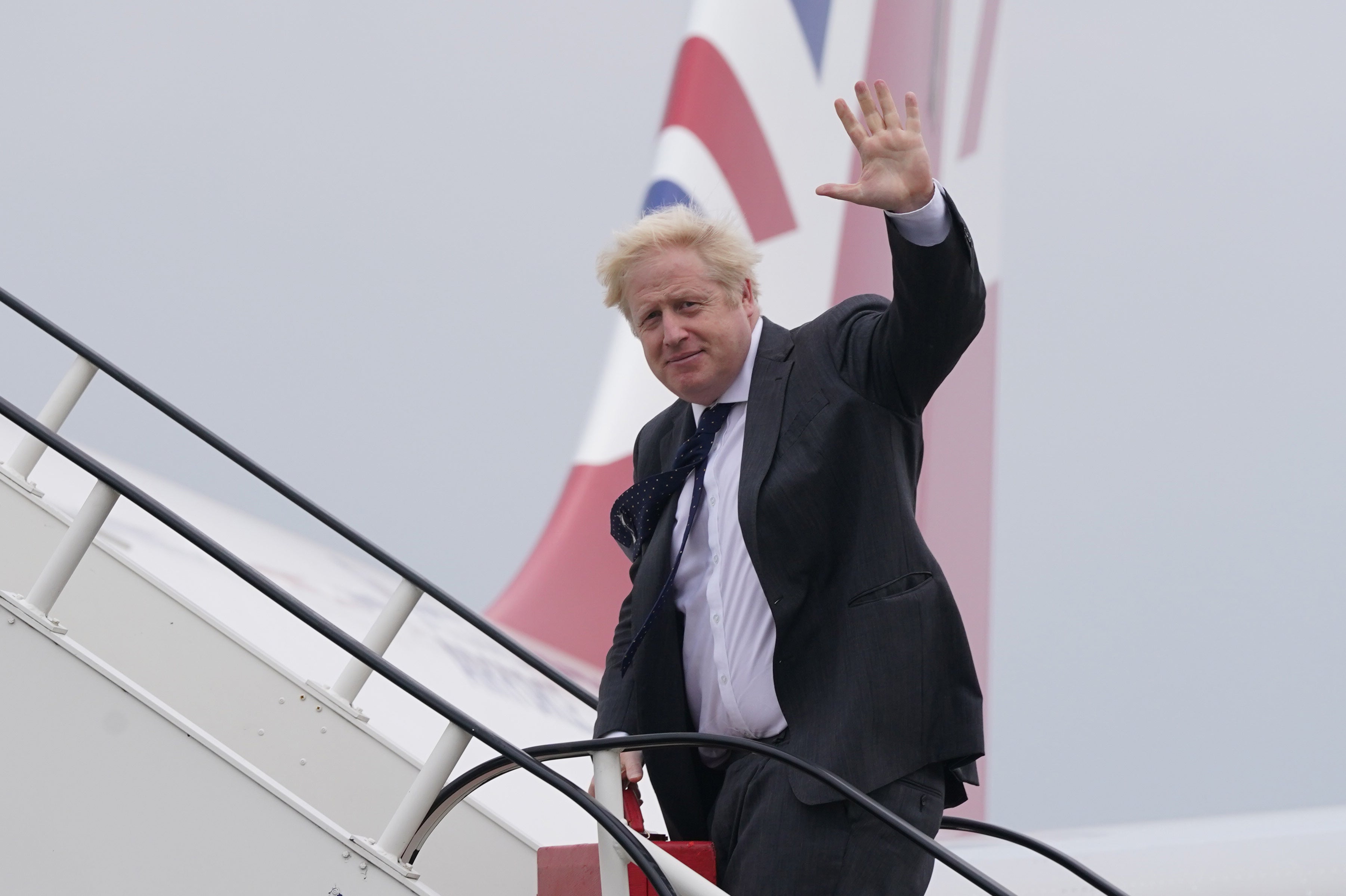 Prime Minister Boris Johnson will urge US president Joe Biden to lift the ban on travel from the UK to the US when they meet at the White House on Tuesday (Stefan Rousseau/PA)