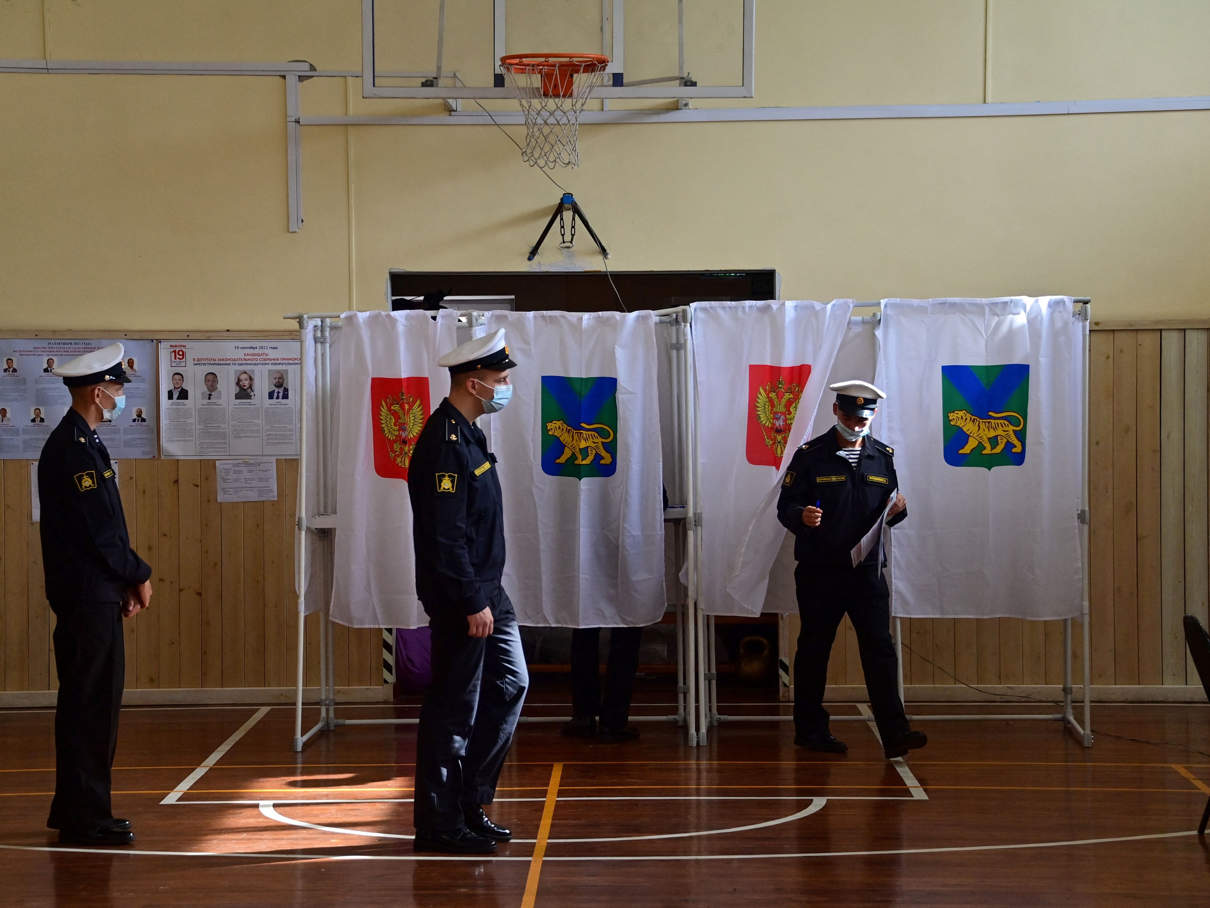 Naval cadets vote on the first day of the three-day parliamentary election in the far eastern city of Vladivostok