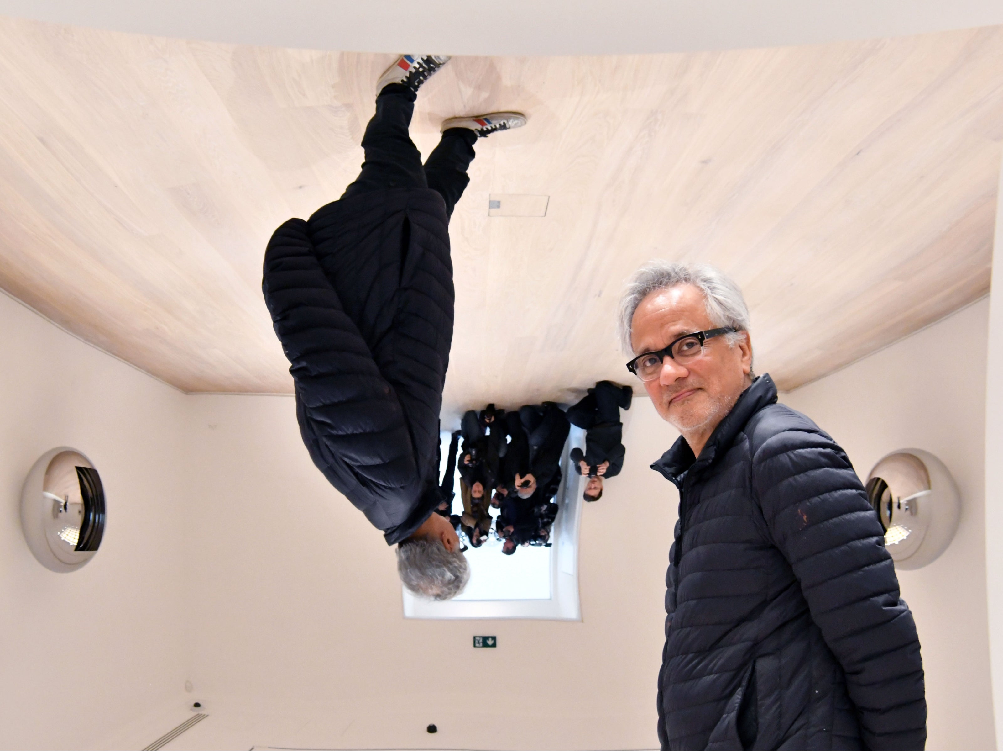 The world turned upside down: Kapoor with his mirror sculptures in 2019