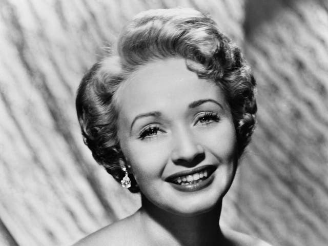 <p>The blue-eyed, blonde and petite Powell was the coloratura ingenue of frothy romances and Technicolor musicals</p>