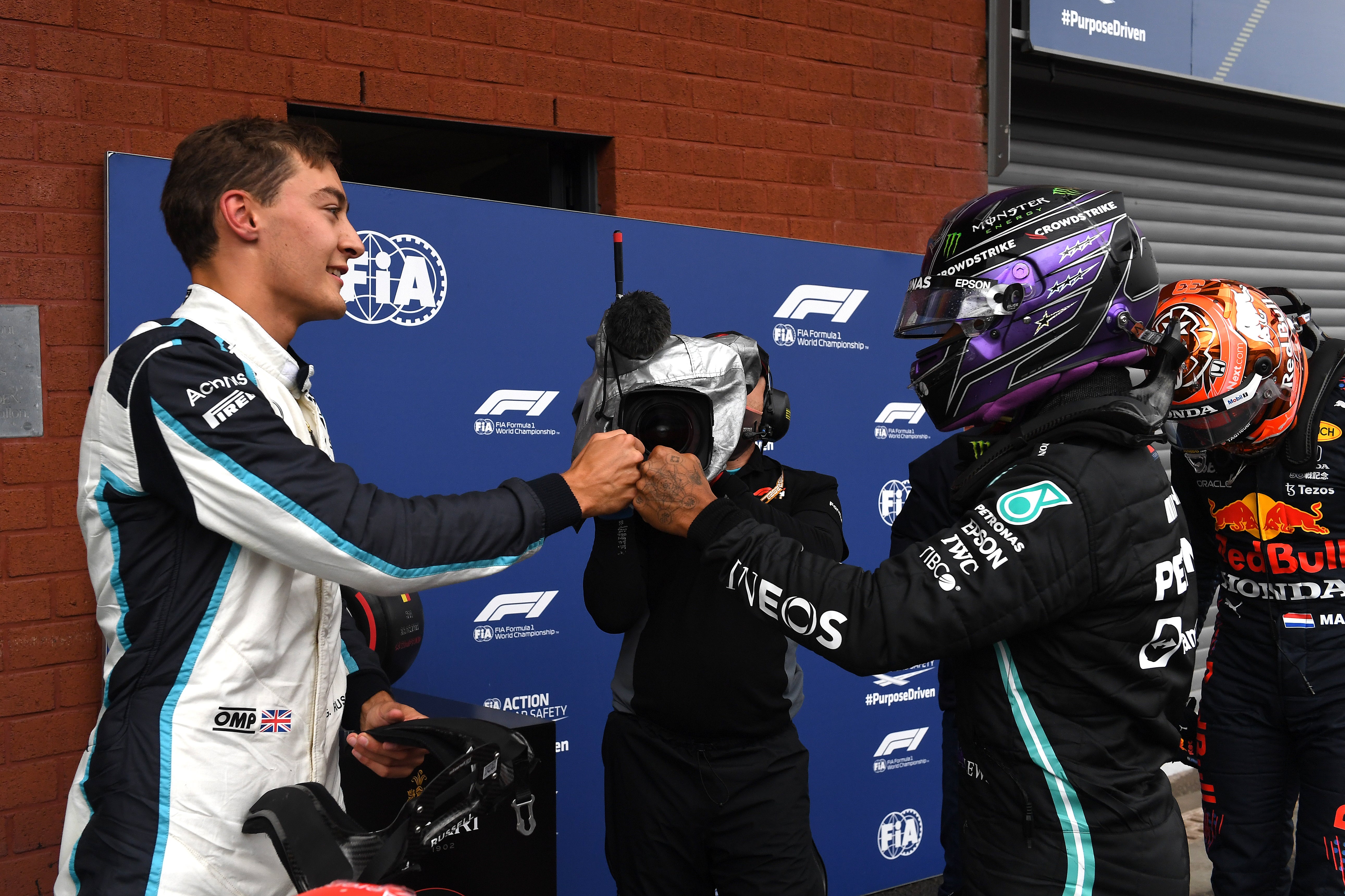 Lewis Hamilton, right, with young driver George Russell