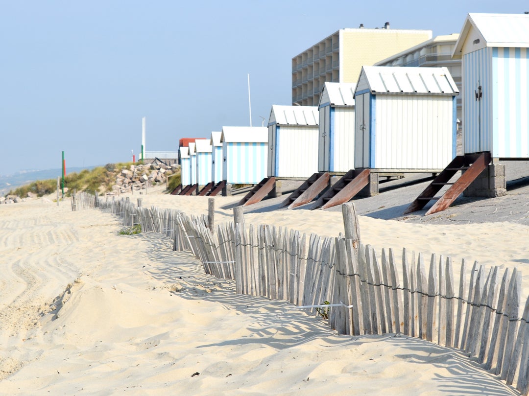 Beach huts on the white sand at Hardelot near Le Touquet