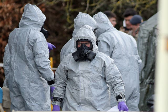 <p>Investigators in hazmat suits respond to the  2018 Salisbury novichok attack</p>