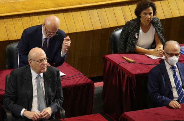 <p>Najib Mikati (left) speaks at the Unesco Palace in Beirut on 20 September. The session, to approve the new cabinet, was interrupted by a power outage </p>