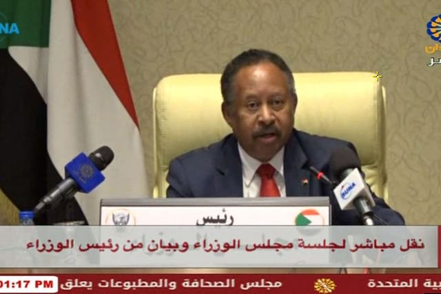 <p>Prime Minister Abdalla Hamdok addressing the cabinet meeting broadcast on state-run TV </p>