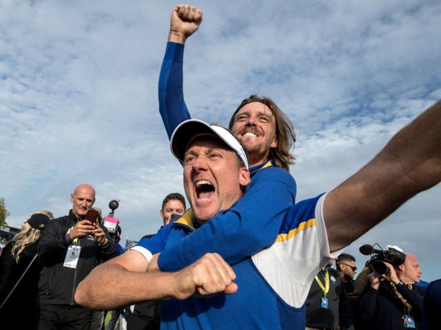 <p>We’ll always have Paris: Ian Poulter and Tommy Fleetwood celebrate victory after the singles matches at Le Golf National in 2018 </p>