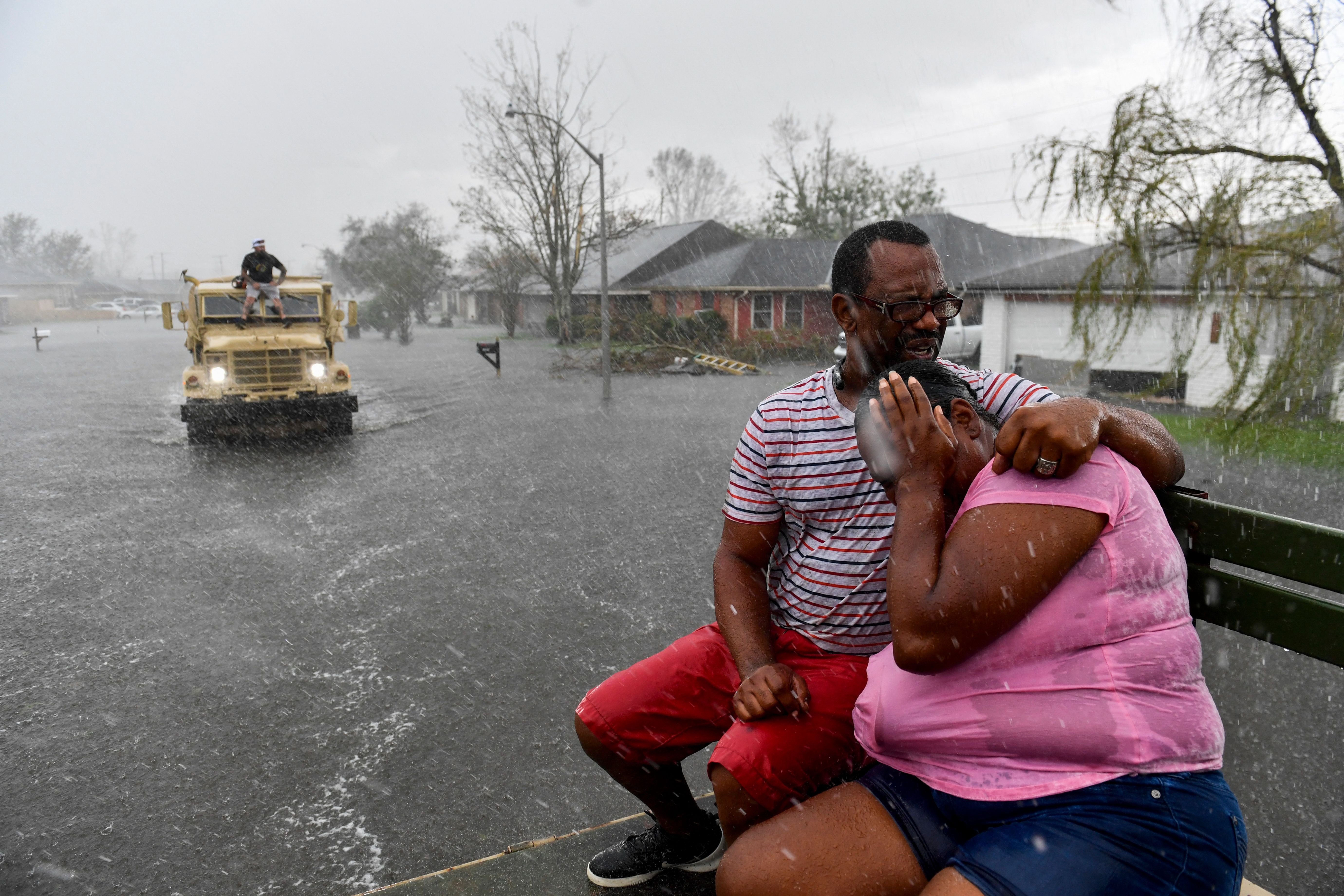 A high-water truck helps people evacuate from their homes after neighbourhoods flooded in LaPlace, Louisiana, in the aftermath of Hurricane Ida