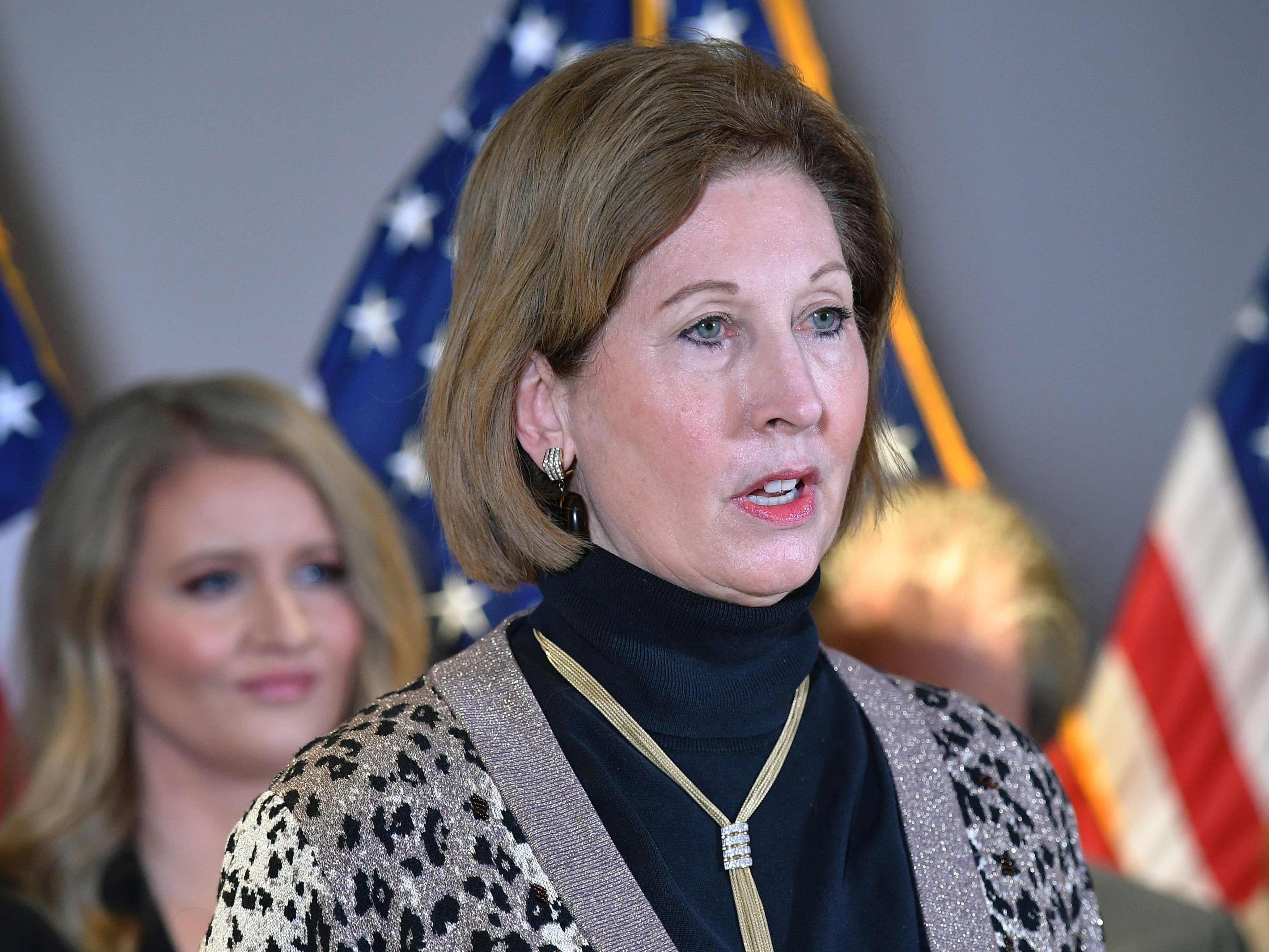 A November 19, 2020 photo shows Sidney Powell speaking during a press conference at the Republican National Committee headquarters in Washington, DC