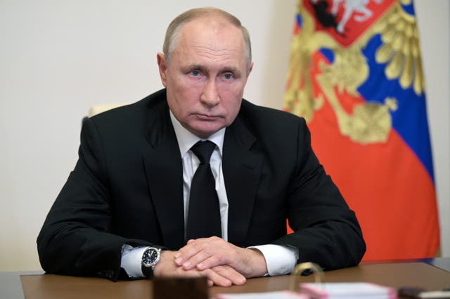 <p>Russian President Vladimir Putin attends a meeting with head of the Central Election Commission</p>