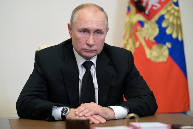 <p>Russian President Vladimir Putin attends a meeting with head of the Central Election Commission</p>