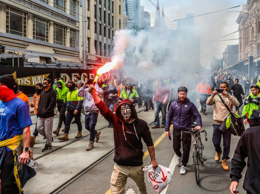 Melbourne riot police fire rubber pellets as Covid protests ‘hijacked by anti-vax and far-right groups’ Melbourne riot police fire rubber pellets as Covid protests ‘hijacked by anti-vax and far-right groups’