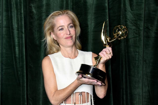 <p>Gillian Anderson holds her Emmy for Outstanding Supporting Actress for a Drama Series on 19 September 2021</p>