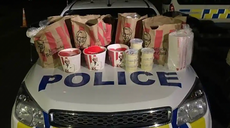 New Zealanders caught smuggling trunk full of KFC