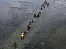 Thousands of Haitians admitted into US in Del Rio as they fight to get back on planes in Port au Prince