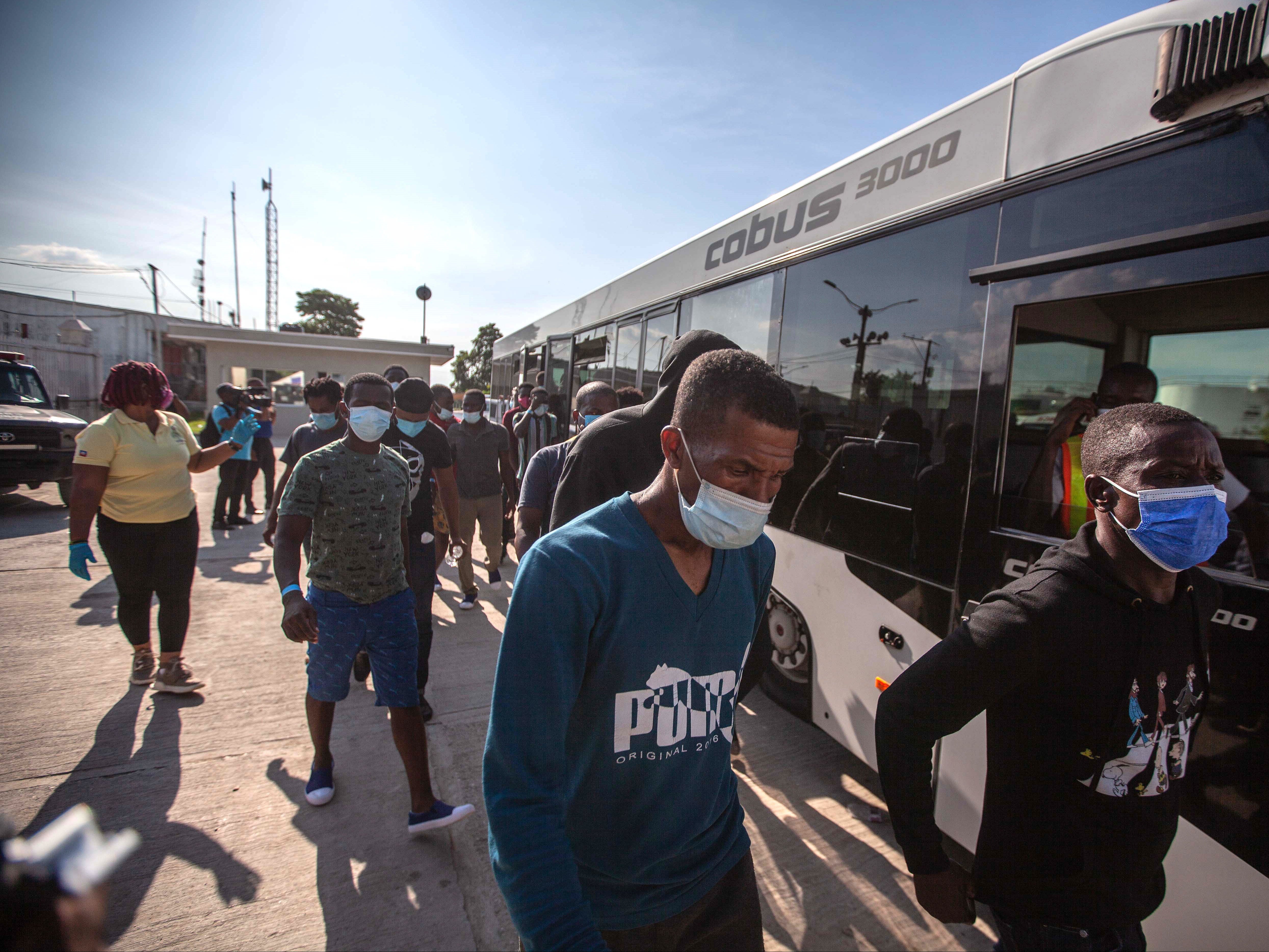 Haitian migrants arriving in Port-au-Prince after deportation from the US