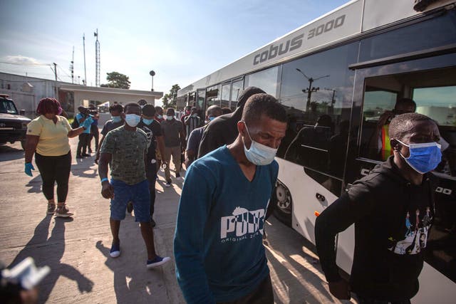 <p>Haitian migrants arriving in Port-au-Prince after deportation from the US</p>