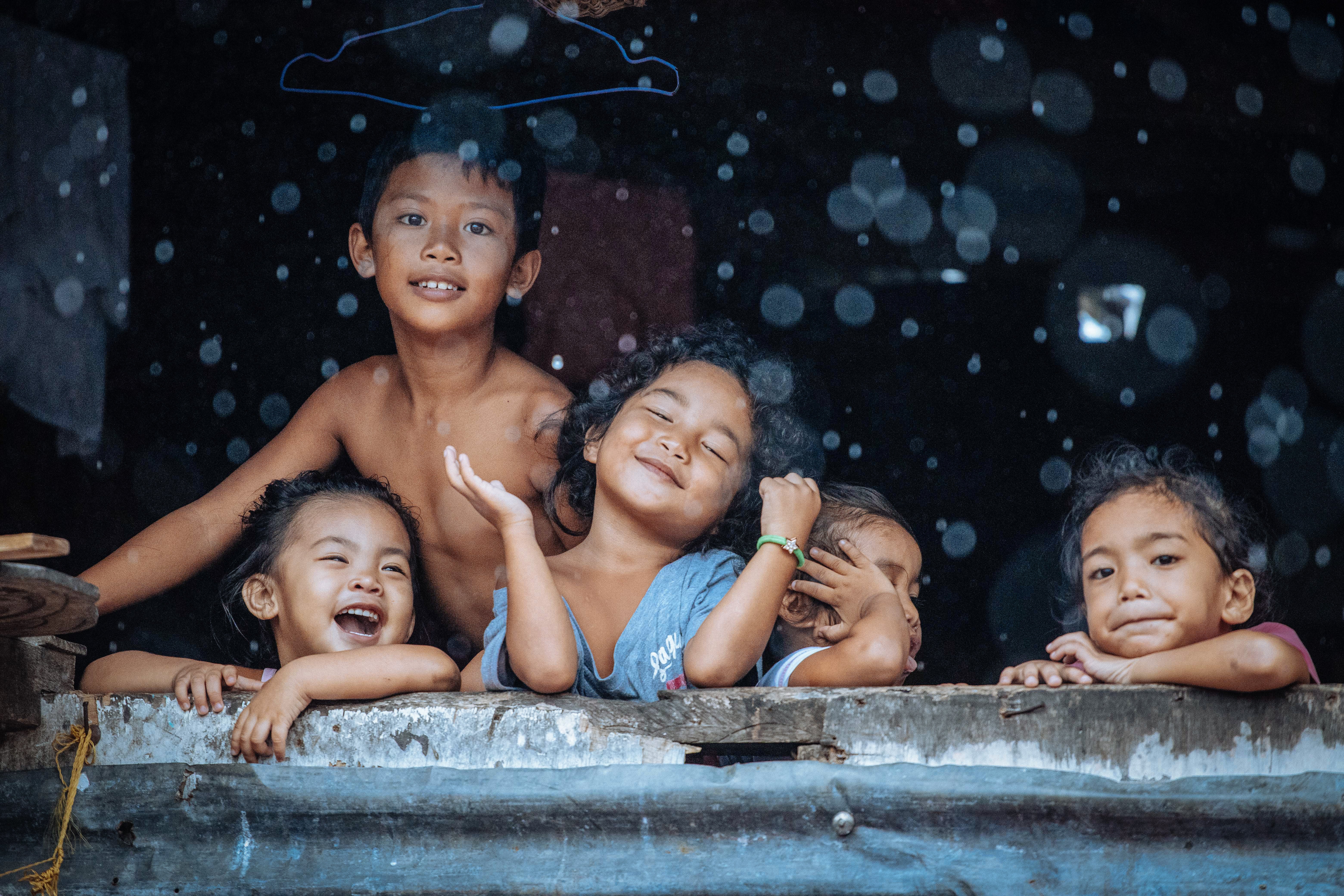 A group of young children in the Philippines (Hartmut Schwartzbach/CEWE Photo Award/PA)