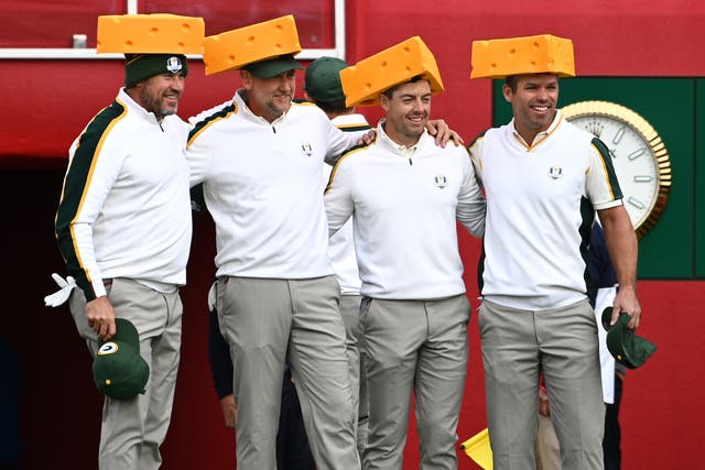 Team Europe’s Lee Westwood, Ian Poulter, Rory McIlroy and Paul Casey (left-right) arrive on the first tee wearing Green Bay Packers cheesehead hats ahead of the 43rd Ryder Cup (Anthony Behar/PA)