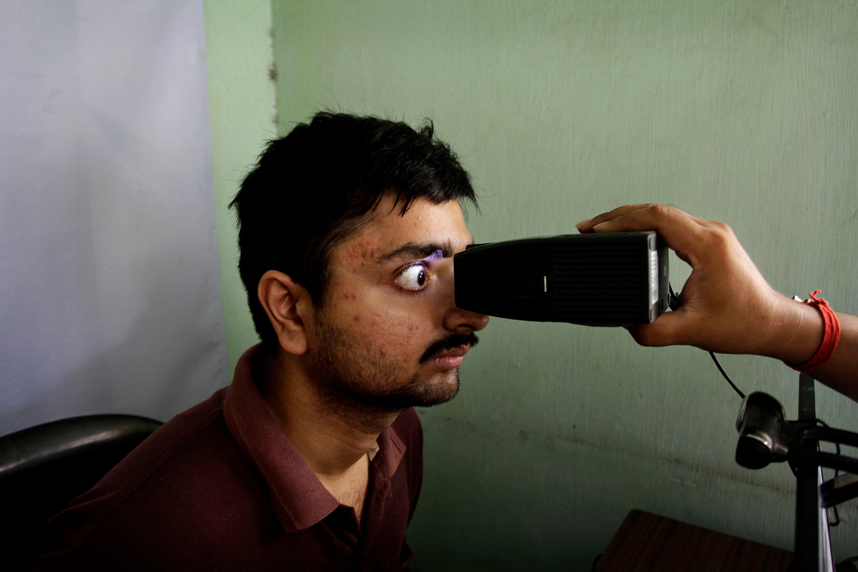 An Indian man gets his retina scanned to register for Aadhar, India’s unique identification project, in Calcutta. The agency responsible for India’s national identification database is among the organisations to have been hacked