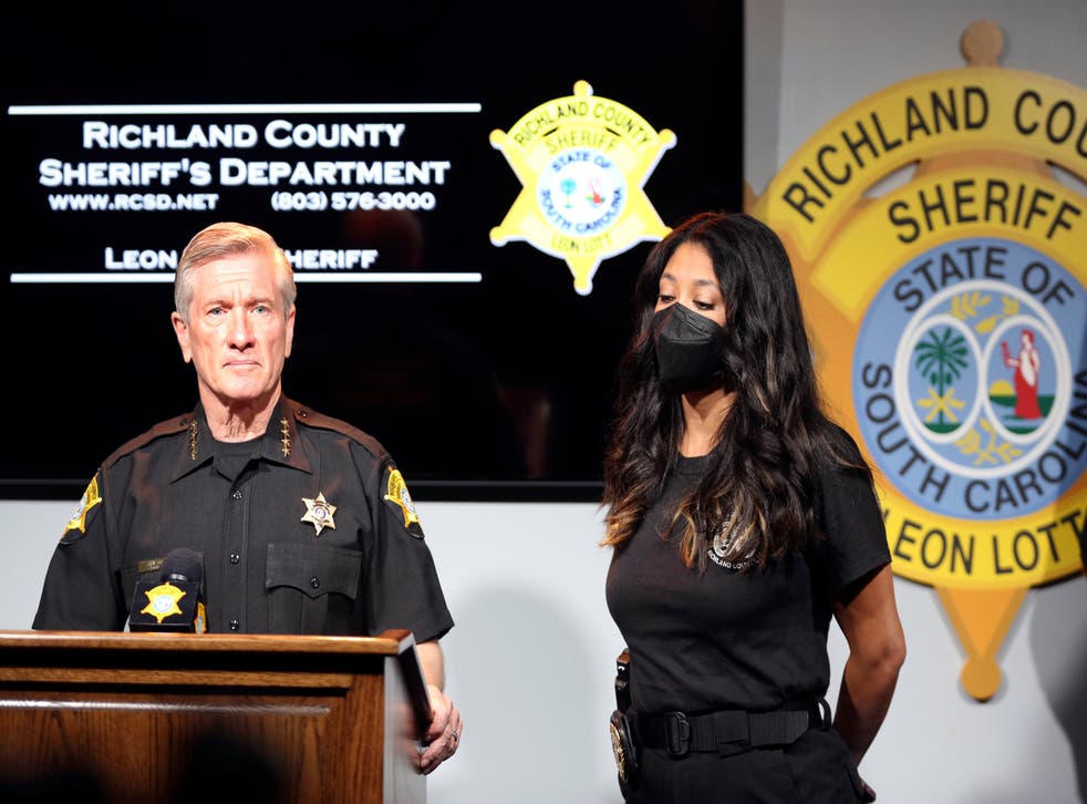 <p>Richland County Sheriff Leon Lott, left, and Coroner Nadia Rutherford, right, talk about the heat deaths of two 20-month-old twin boys during a news conference on Tuesday 21 September 2021, in Columbia, South Carolina. </p>