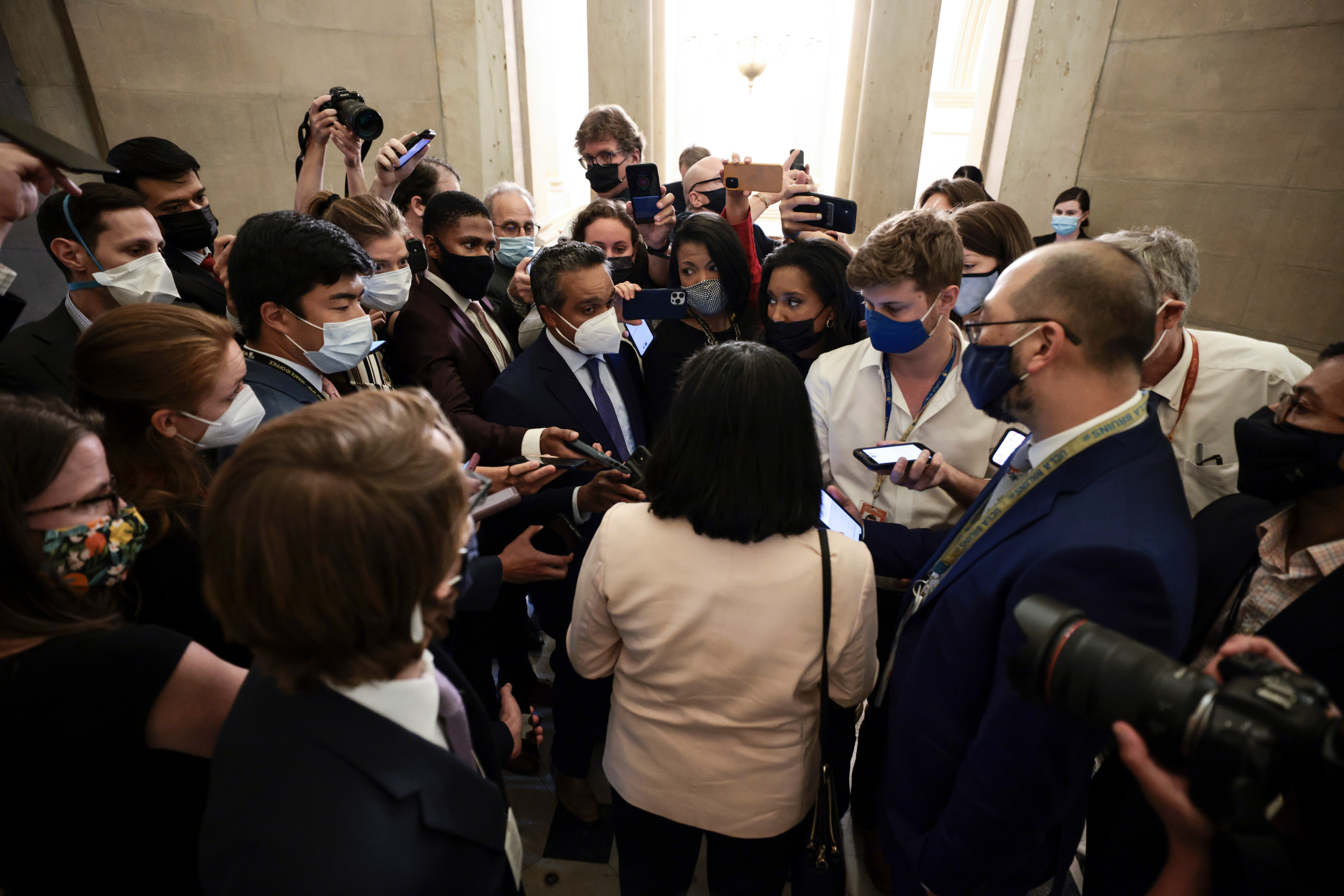 Rep Pramila Jayapal (D-WA) is swarmed by reporters after a meeting with House Speaker Nancy Pelosi(D-CA) in her office in the U.S. Capitol Building on September 21, 2021 in Washington, DC