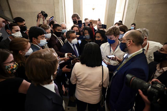 <p>Rep Pramila Jayapal (D-WA) is swarmed by reporters after a meeting with House Speaker Nancy Pelosi(D-CA) in her office in the U.S. Capitol Building on September 21, 2021 in Washington, DC</p>