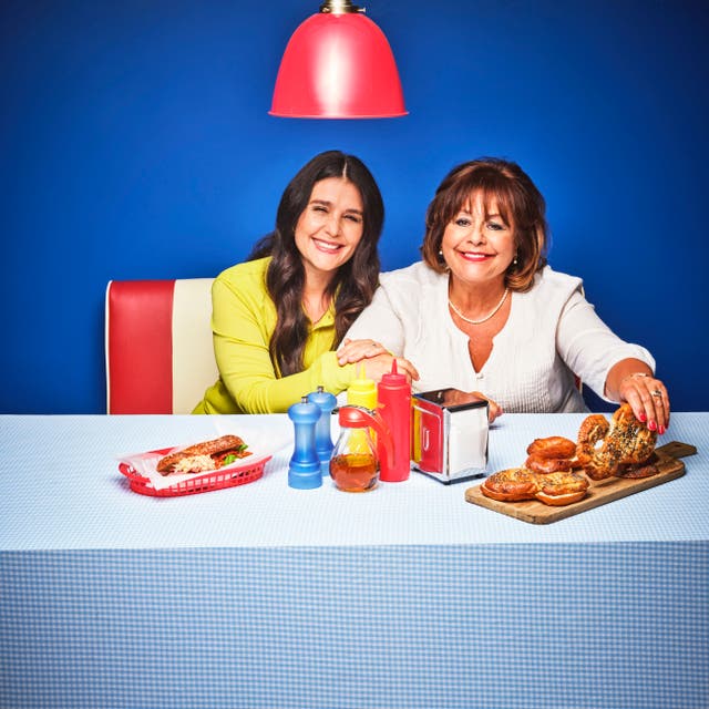Jessie and Lennie Ware enjoy Twist & Share Bagels, designed to celebrate the British Airways American Express® Cards Companion Voucher benefit which could entitle you to a second seat for a companion when you make a Reward Flight booking (Handout/PA)