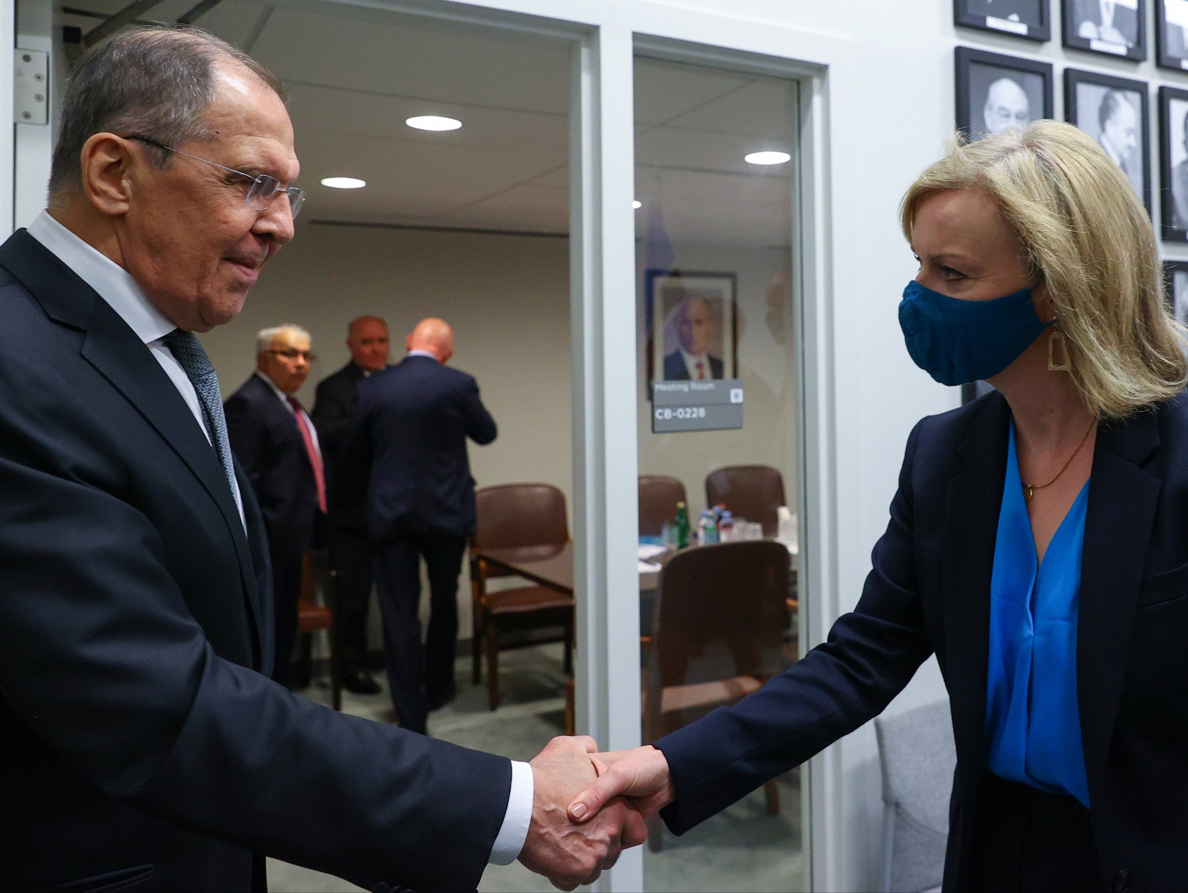 Russia’s Foreign Minister Sergei Lavrov shakes hands with Britain’s Foreign Secretary Liz Truss during a meeting on the sidelines of the 76th Session of the United Nations General Assembly on 22 September 2021