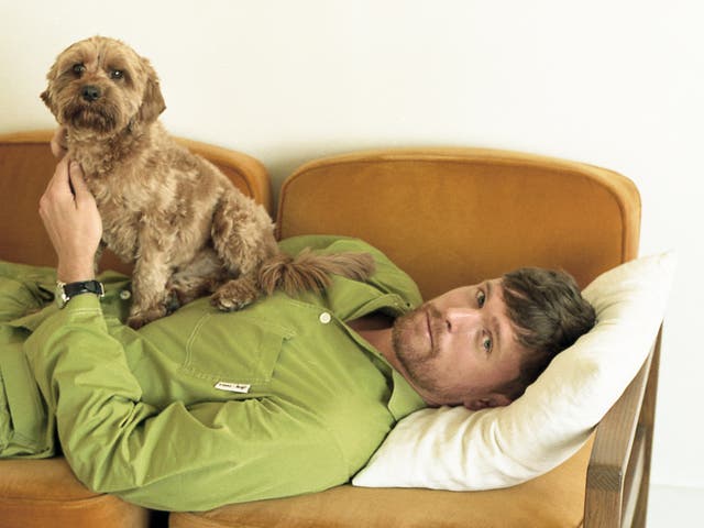 <p>Blake pictured with his beloved poodle mix, Barold </p>