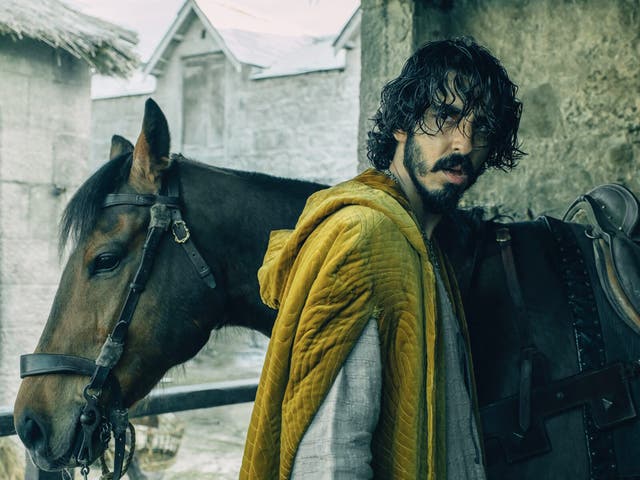 <p>Dev Patel (and trusty steed) in ‘The Green Knight’</p>