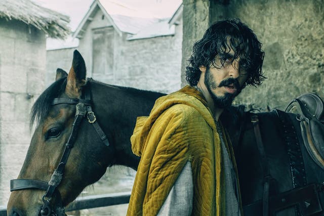 <p>Dev Patel (and trusty steed) in ‘The Green Knight’</p>