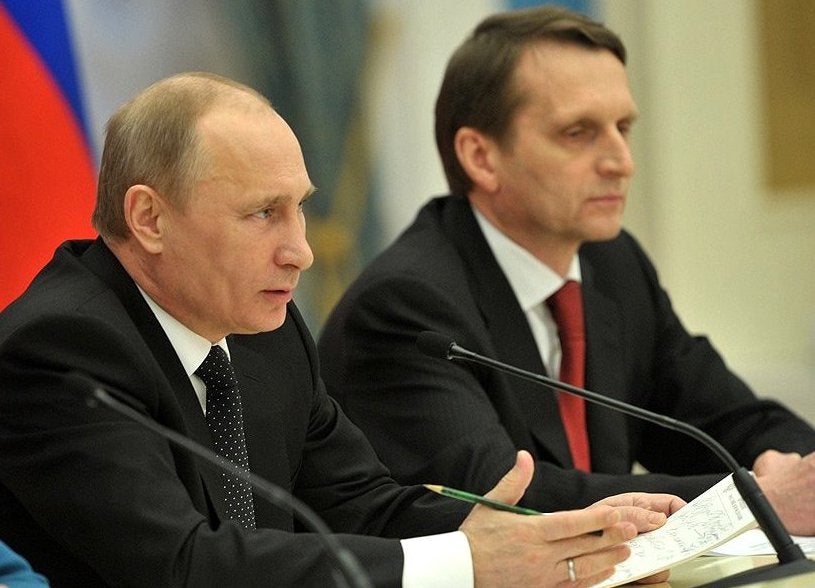 Russian President Vladimir Putin and spy chief Sergey Naryshkin