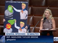 Marjorie Taylor Greene rants about China controlling Biden with giant Scooby Doo sign and cringeworthy errors