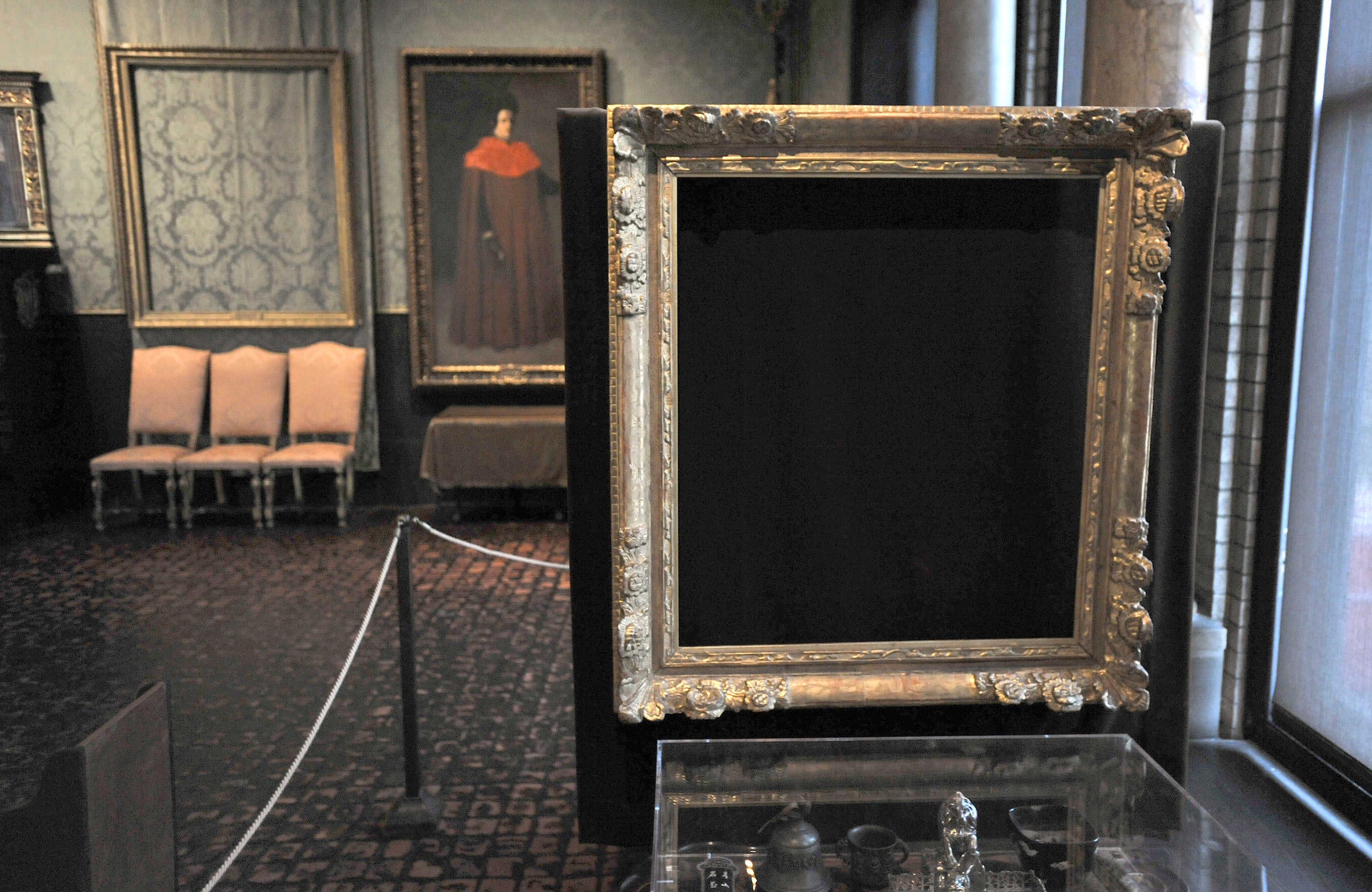 Empty frames are now displayed where the stolen paintings hung in the Boston museum